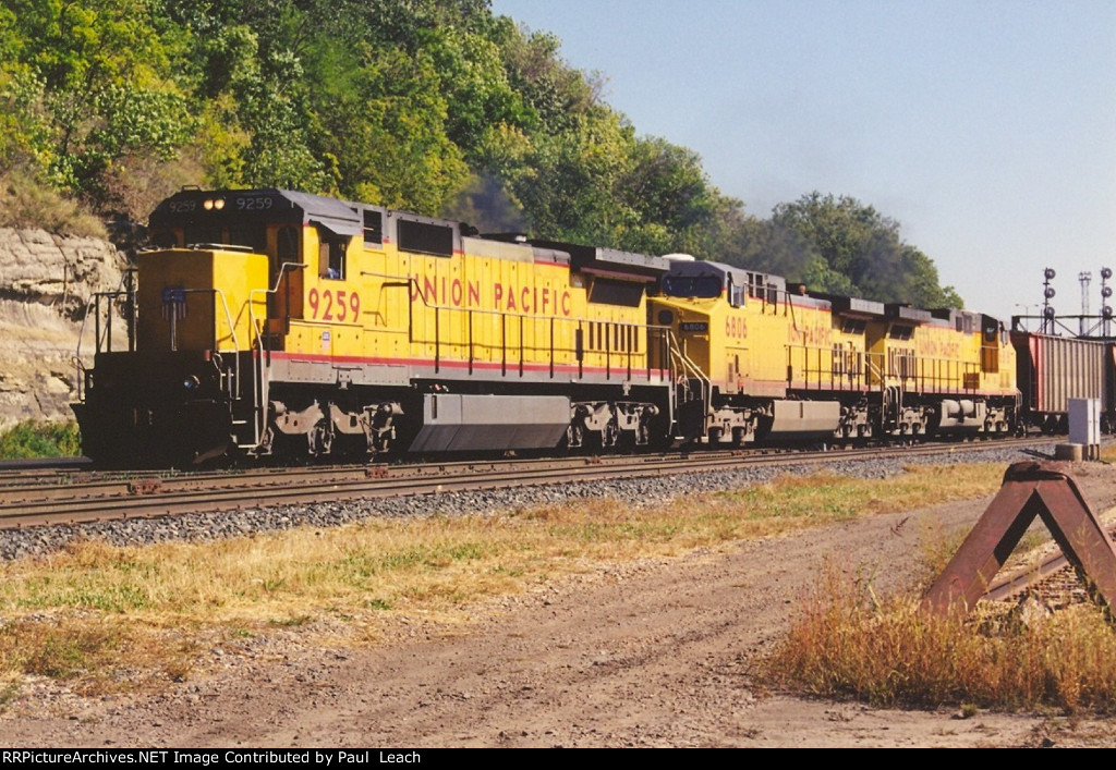 Loaded coal train rolls west